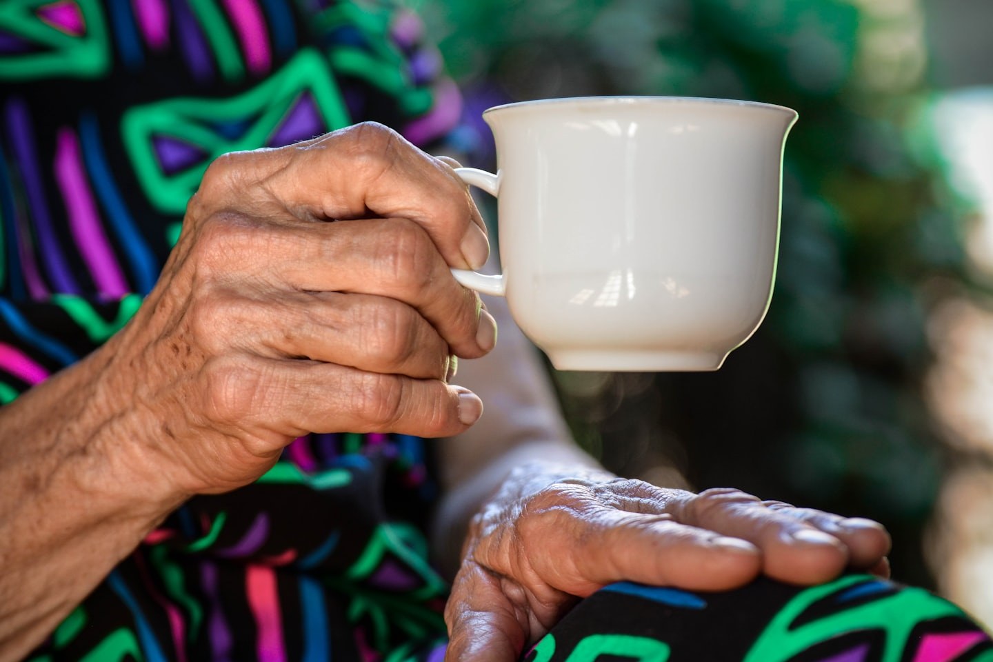 Hands holding a warm cup